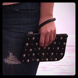 Express: Black skull-emblem wristlet